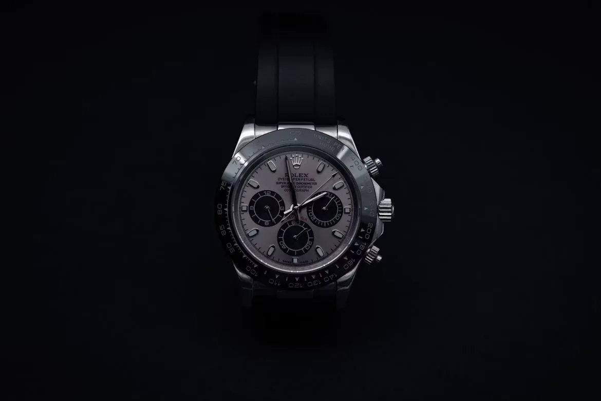 Rolex Cosmograph Daytona chronograph watch with black dial and tachymeter bezel